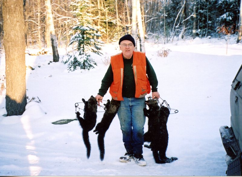 The author - Bob Noonan - with fisher caught in ground sets with CTM 5x5s.