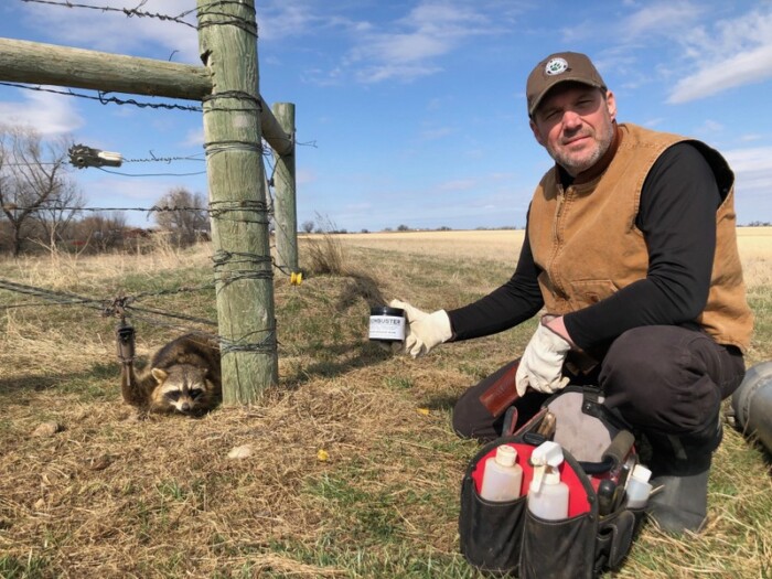 Alan Probst and Raccoon caught using Coon Buster